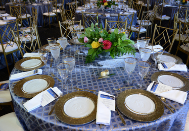 A format table at a gala set with china in the Park's Spanish Ballroom