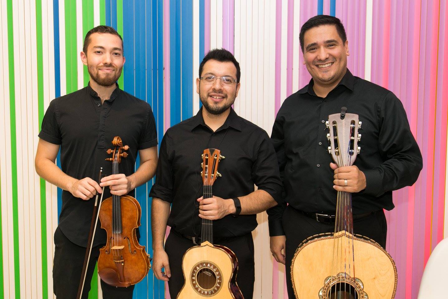 Grupo Fenix holds their instruments