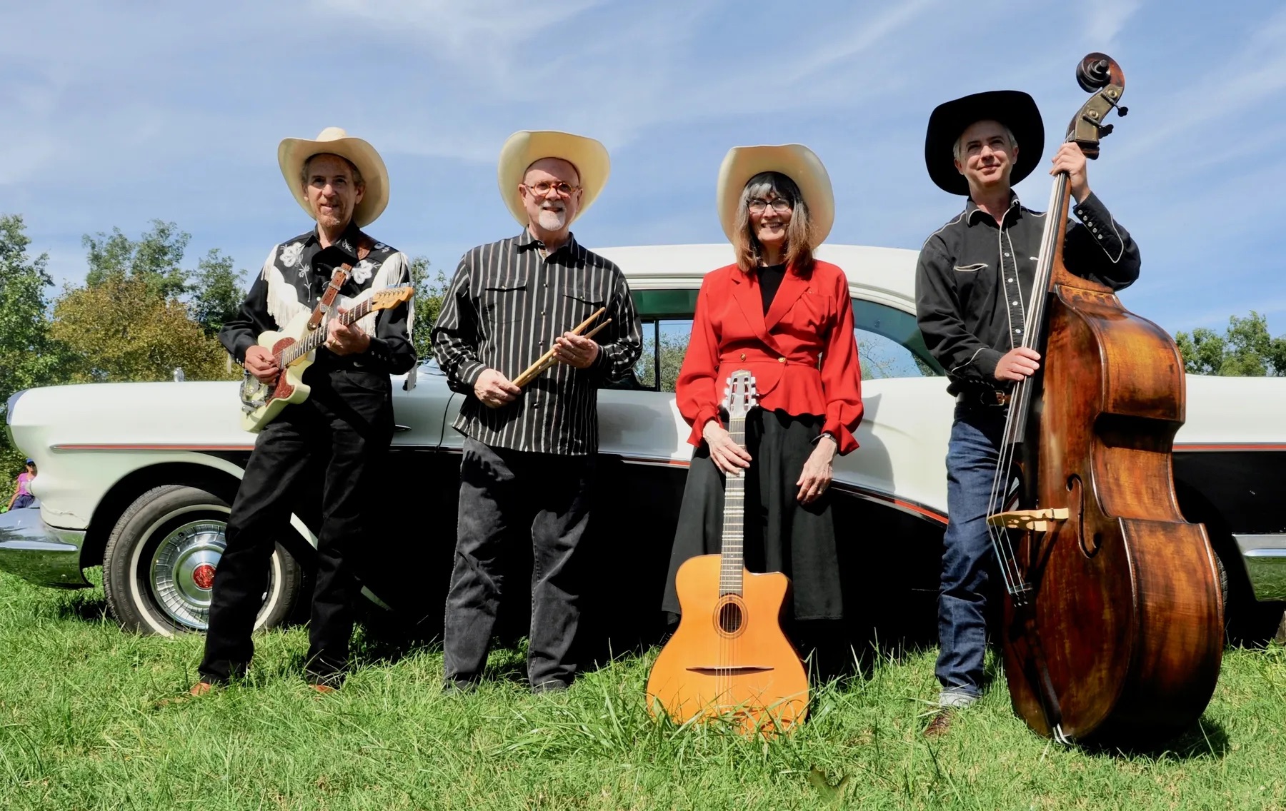 the Backroads Band hold their intstruments