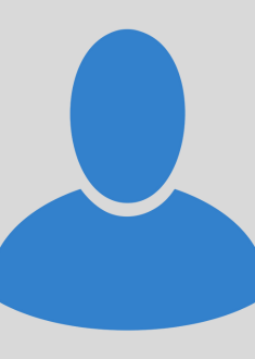 blue placeholder icon for a staff member without a photo. head and body of a generic person are reprsented by blue shapes. 