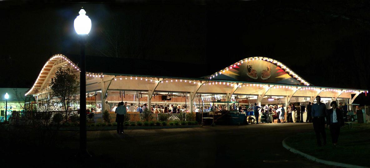 The bumper car pavilion lit up at night 