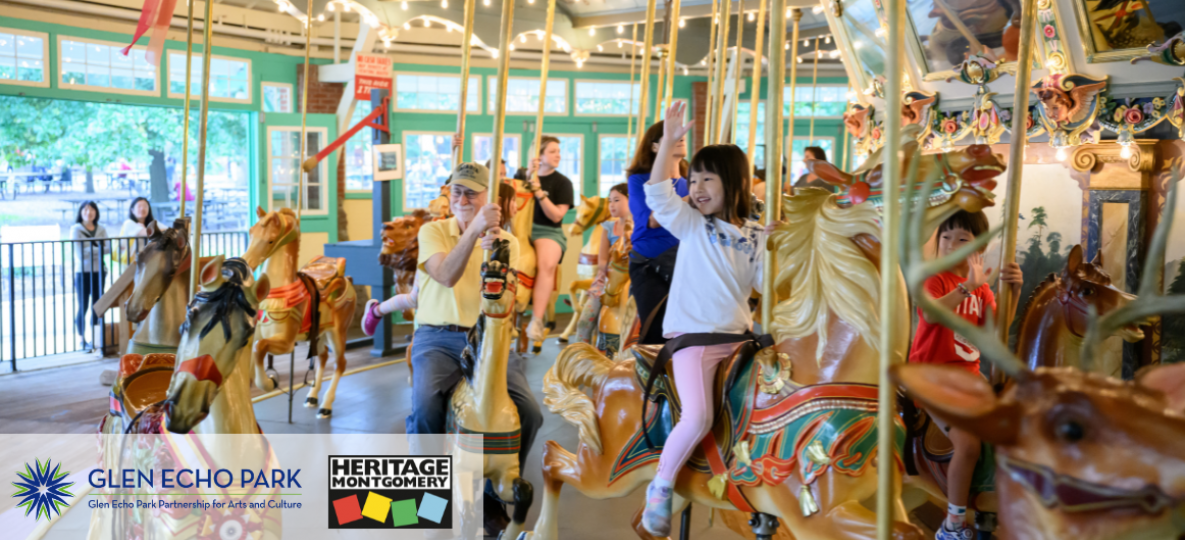 Visitors ride a carousel