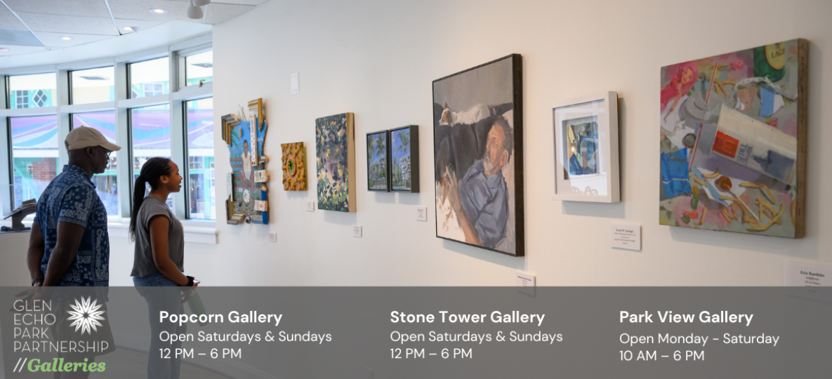 Visitors view artwork in a gallery