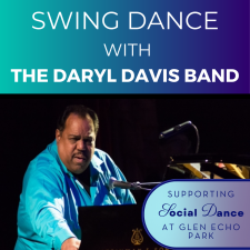 Daryl Davis sits at a piano