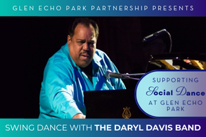 Daryl Davis sits at a piano