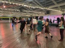 dancers in the bumper car pavilion