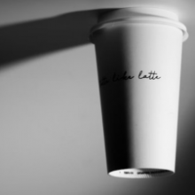 Black and white photograph of a coffee cup