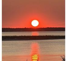 A photograph of a sunset