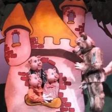 Puppet pigs and a wolf