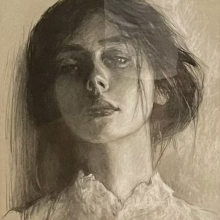 A charcoal drawing of a woman